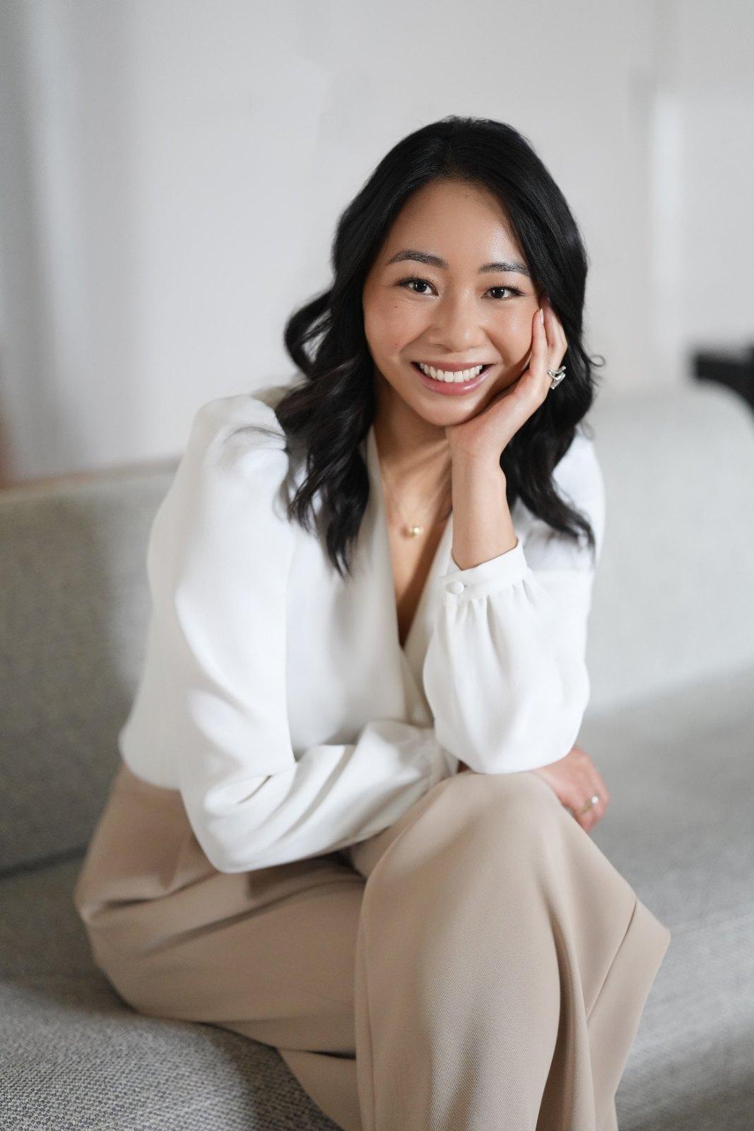 Dr. Mary Sun, seated, smiling at the camera